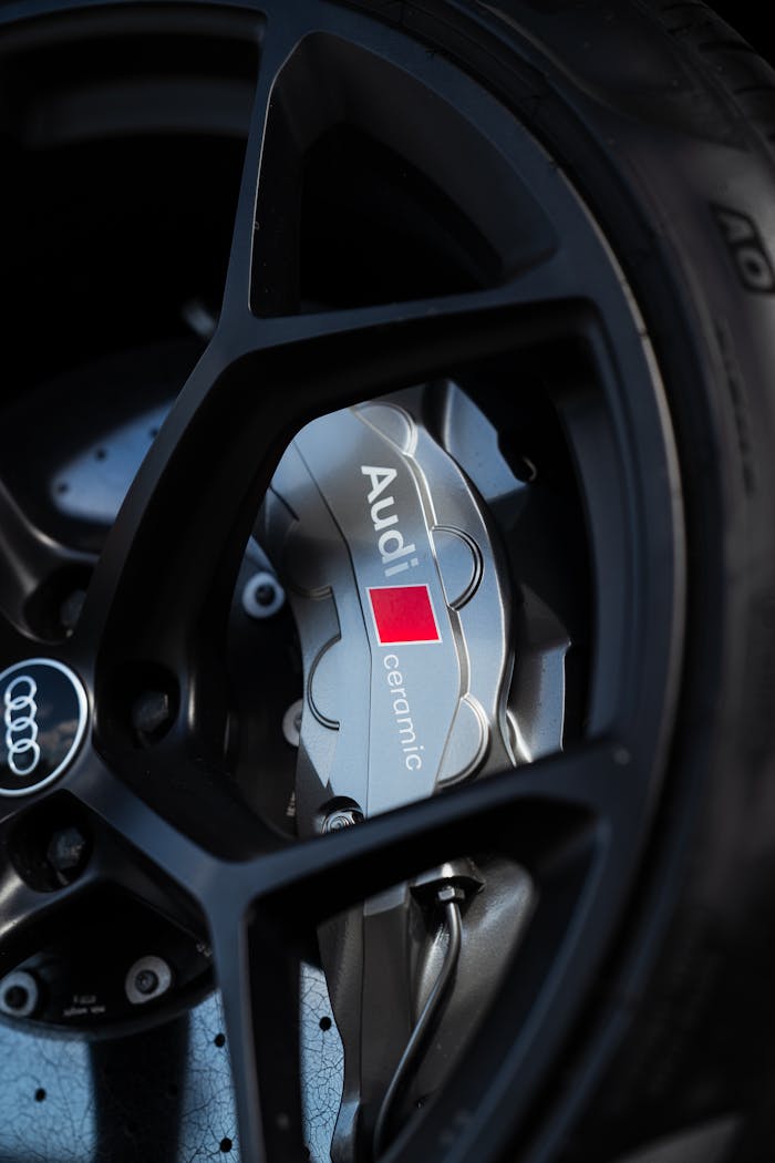 High-resolution image of an Audi car wheel and ceramic brake system.